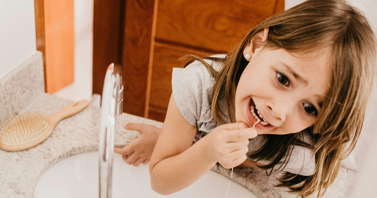 Flossing Kids’ Teeth: When, Why & How?